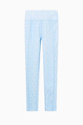 Light blue pants with a subtle pattern on a white background