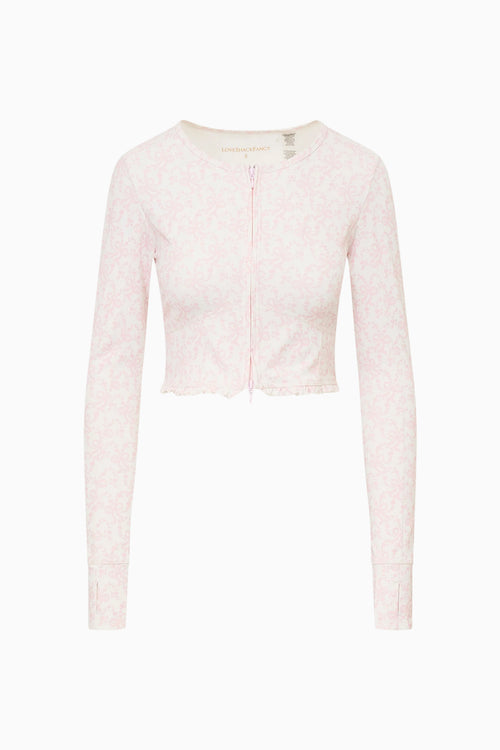 Light pink textured cardigan on a white background