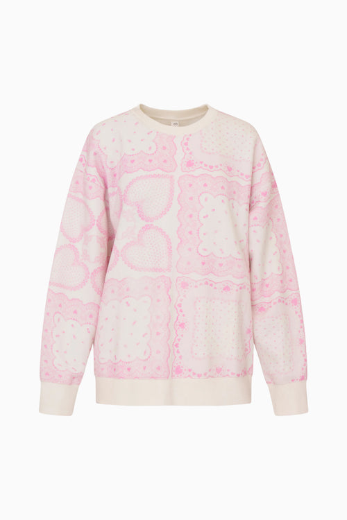 Pink and white tie-dye sweatshirt on a white background