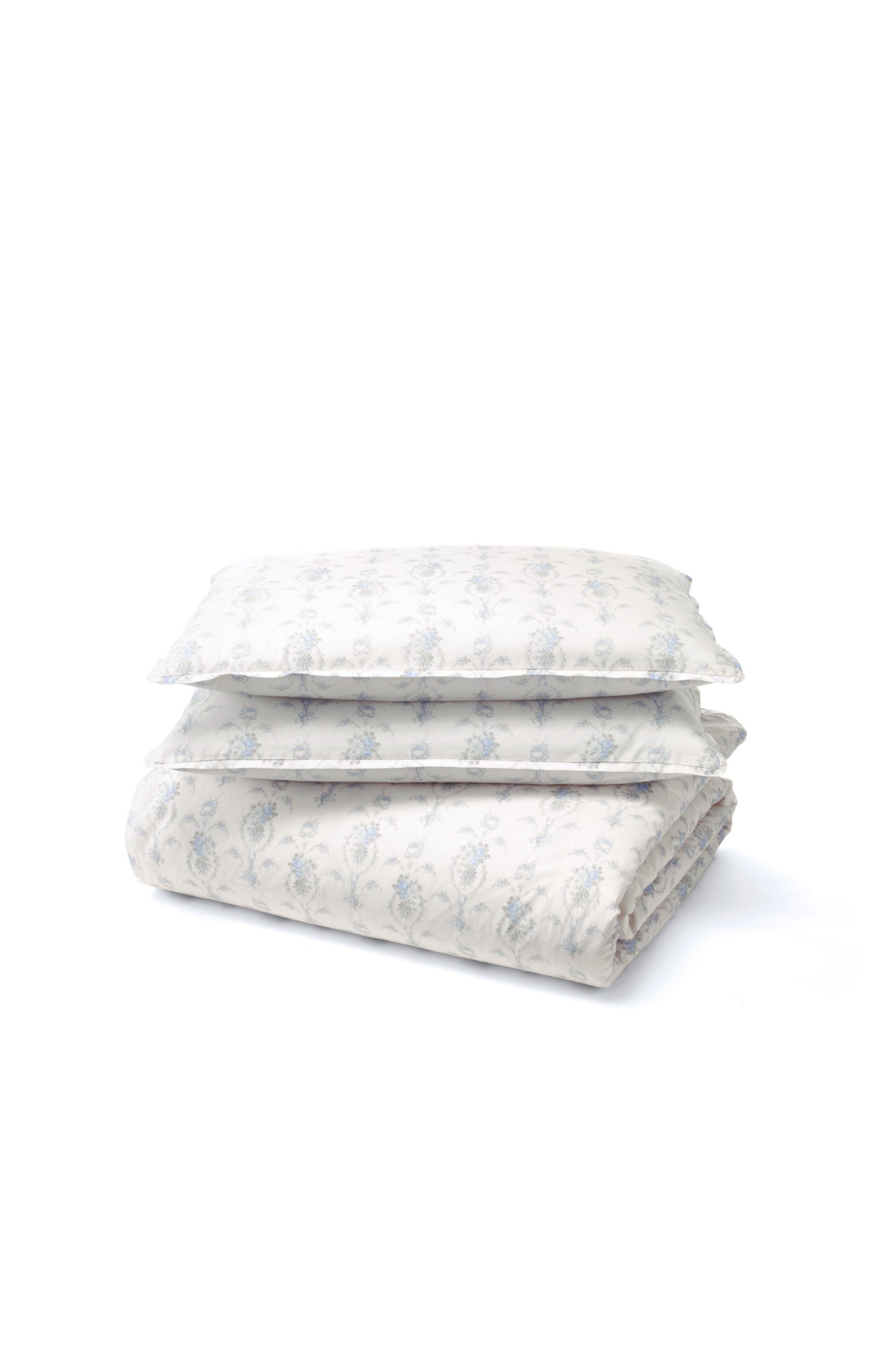 Delicate blue floral pattern against a pristine white Pillow. Crafted from 100% cotton