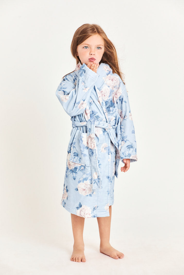 Little girls bath robe - blue floral design with two square pockets in front and tie at waist.