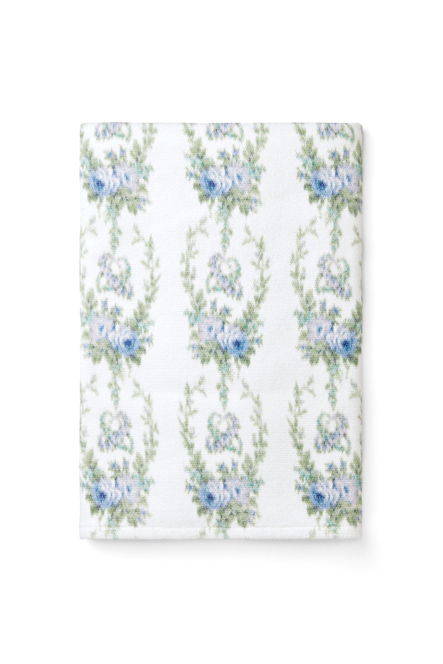 vintage-inspired repeating floral print bath towel in a soft blue against a white back