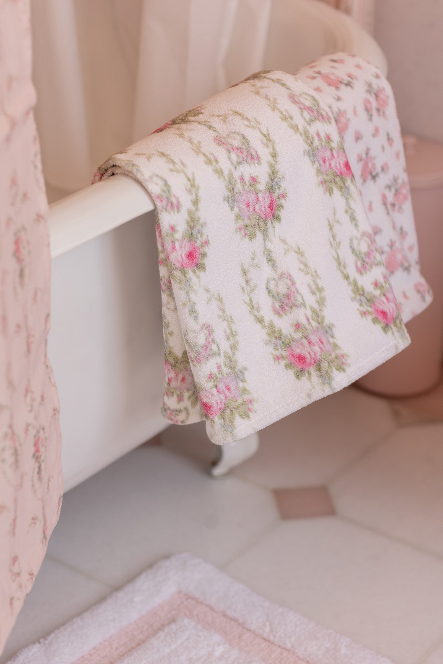 Toile De Fleurs Pink draped over bathtub 