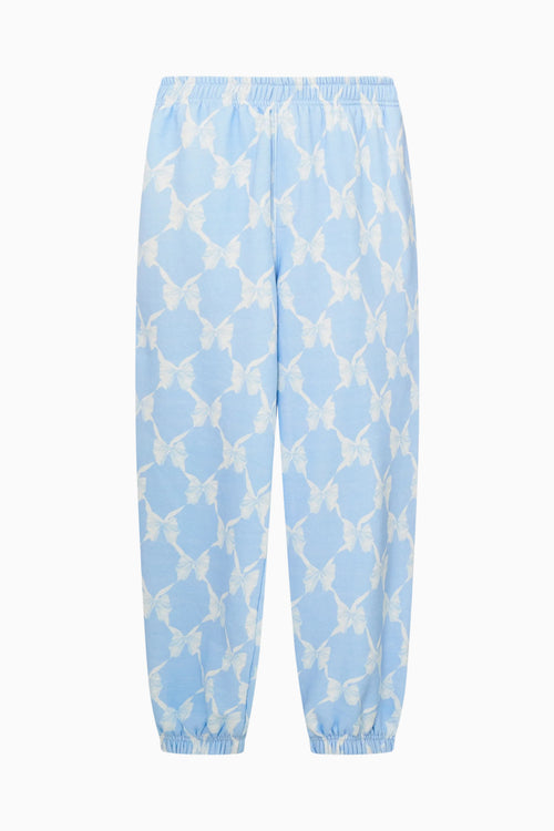 Light blue pants with a geometric pattern on a white background