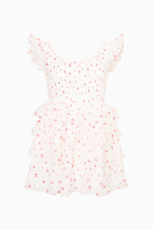 White dress with red floral pattern on a white background