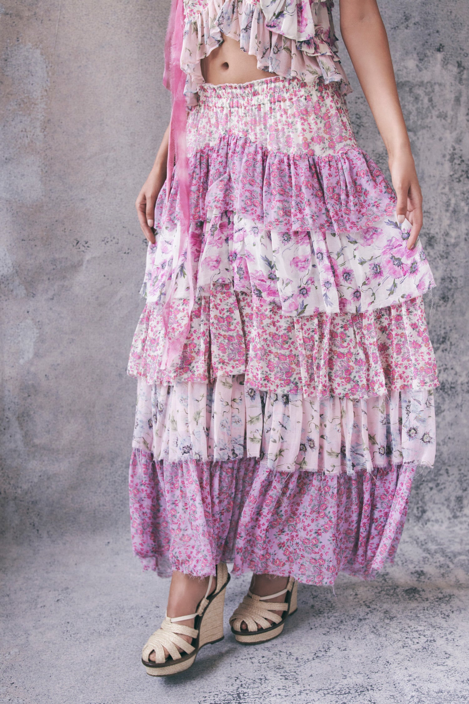 Close up image detailing patterns and ruffles of pink ruffle maxi skirt - DUSTRYROSEMEDLEY