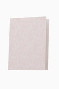 Light pink textured card on a white background