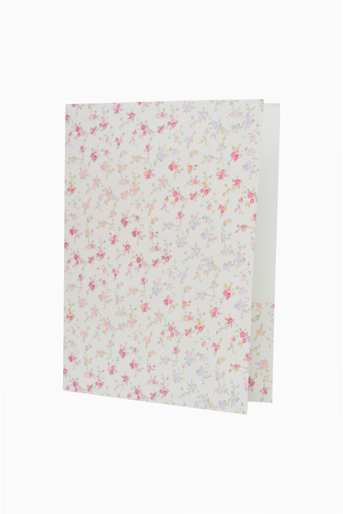 Floral-patterned paper on a white background