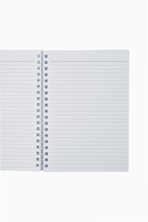 White notebook with ruled pages on a white background