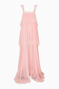 Pink tiered dress on a white background