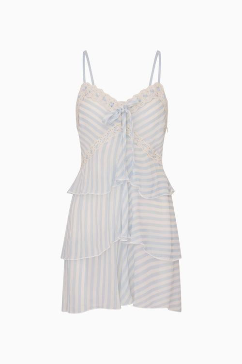 White and blue striped and tiered mini dress on white background
