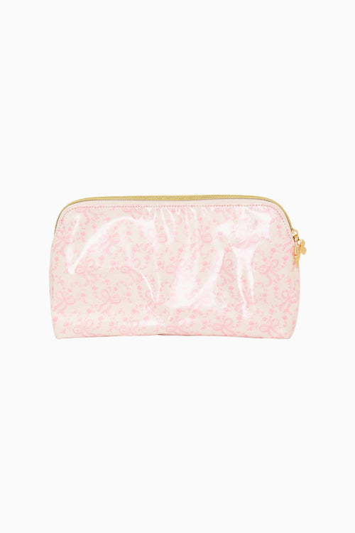 Pink pouch with gold zipper on a white background