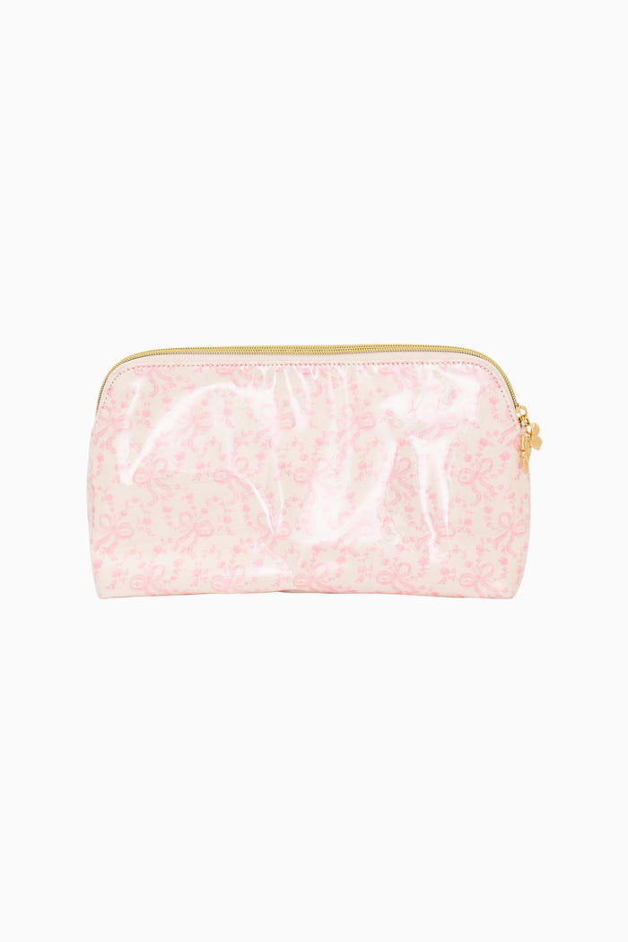 Pink pouch with gold zipper on a white background