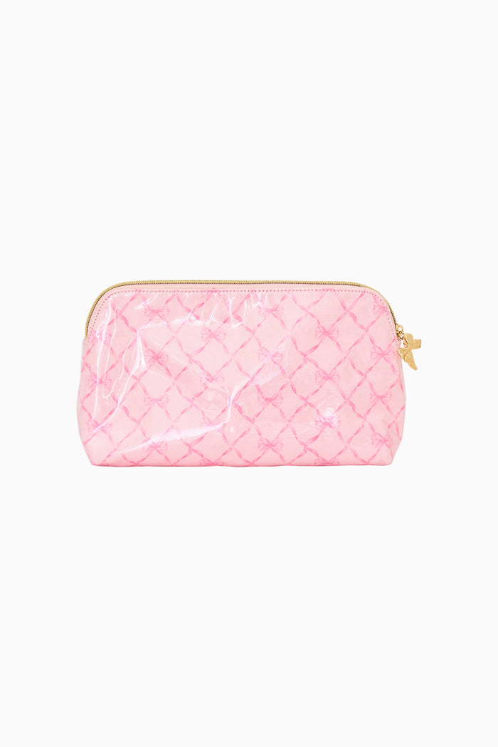 Pink bow print cosmetic bag on a white background