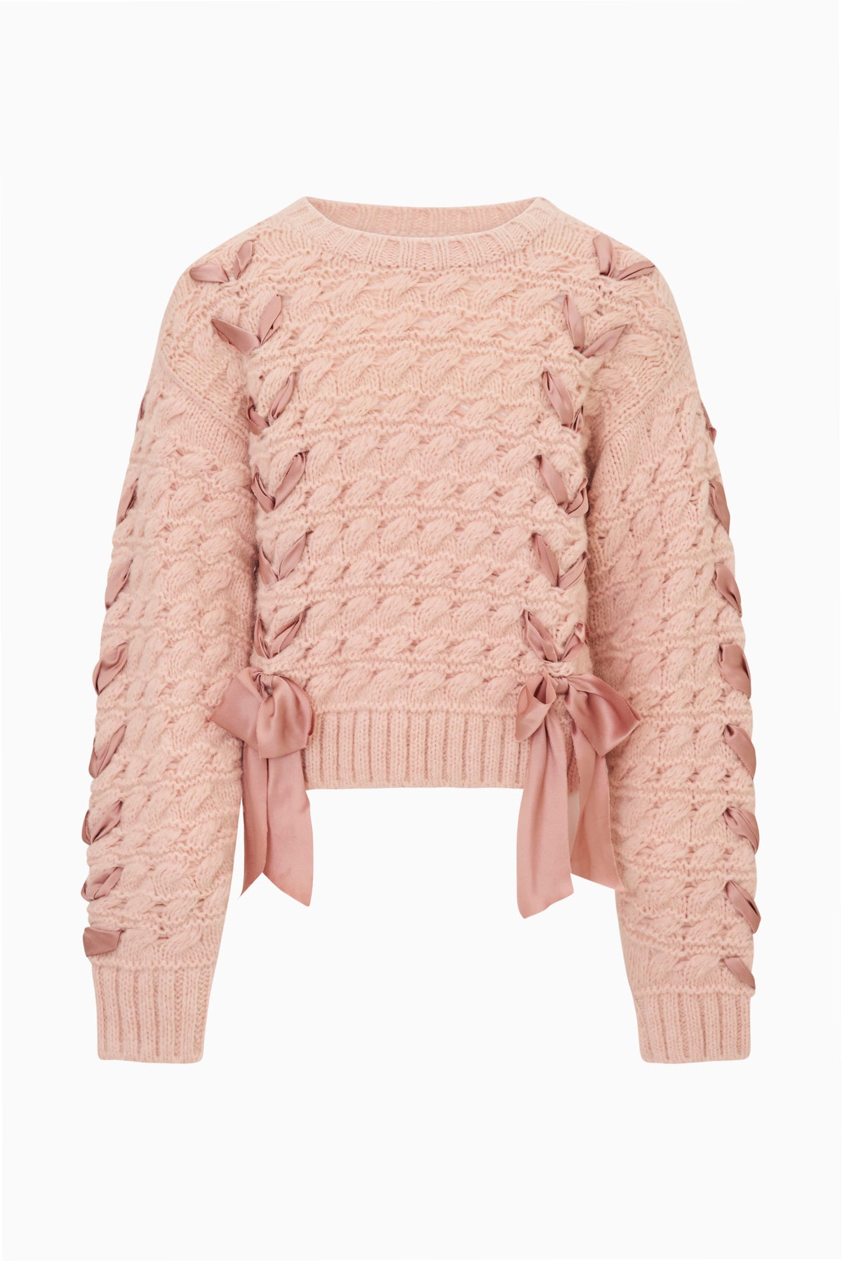 Tween pink textured knit pullover with ribbon threaded through and bow at hem