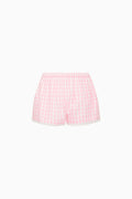 Pink and white gingham shorts on a white background