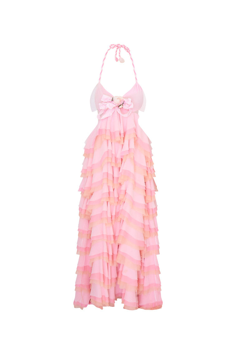 Occasion maxi dress featuring a medley of colors– pinks, corals and creams. Beings with a halter neckline and braided straps before descending to a sweeping, multi-tiered ruffle skirt.