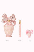 Three mini perfume bottles with pink bows, plus slim roller-style bottle