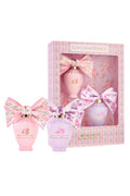 Eau de parfum set with three pink mini bottles, each with floral label and ribbon bows