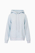 Light blue hoodie with small patterns on a white background