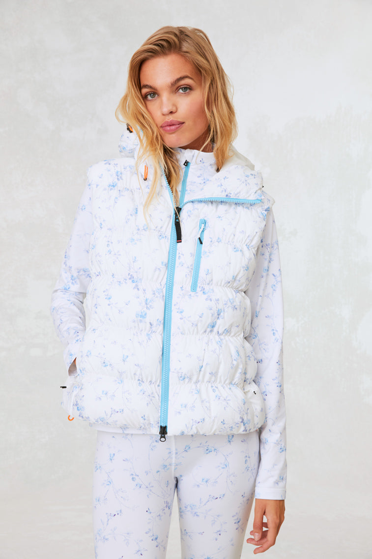 Quilted puffer vest with drawstring hood and two-way zipper