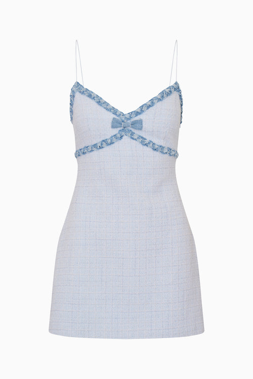 Blue tweed mini dress with blue lace details on a white background