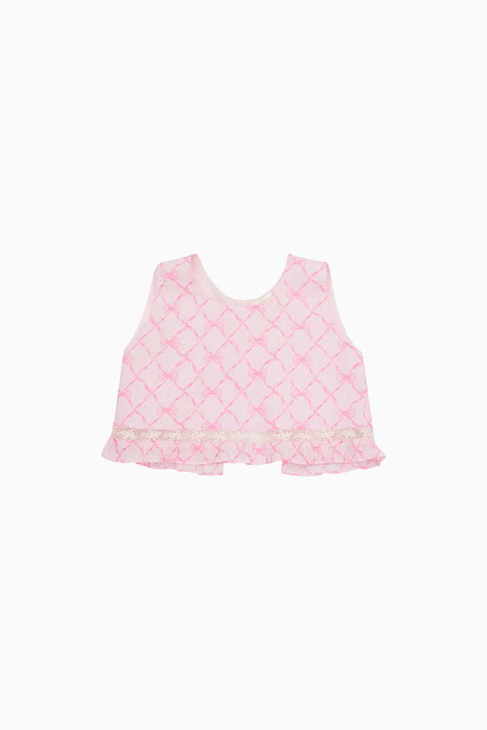 Ruffled pink bow print baby top against a white background.