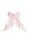 White floral bow clip-in.