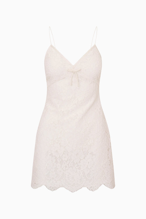 Ivory lace dress on a white background