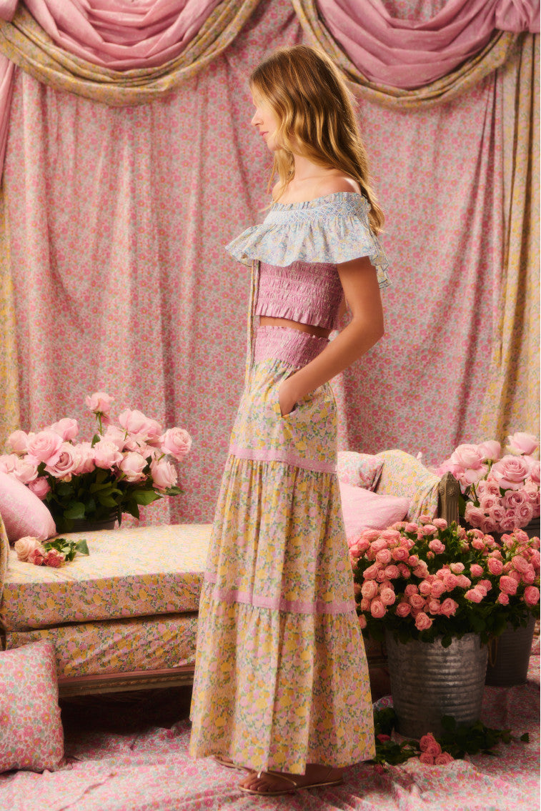 Two-toned floral printed maxi skirt featuring a smocked waistband before falling to a three tiered skirt.