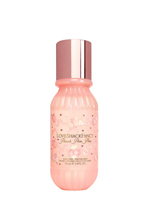 Pink bottle with rose gold cap on a white background