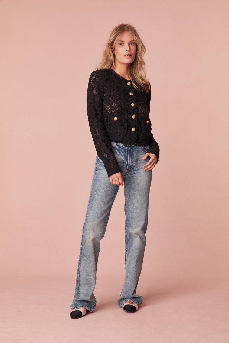 Jacket with floral lace with texture for elevated detail. The jacket features sheering, custom gold military buttons, and chic satin trim details.