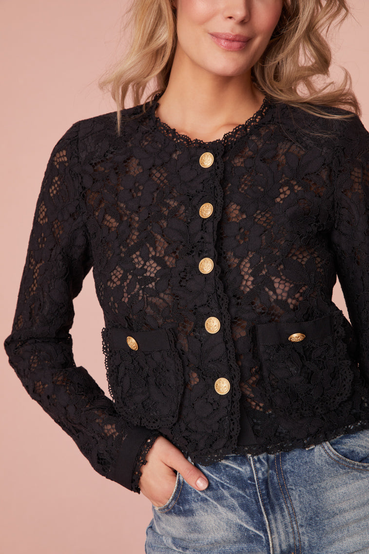 Jacket with floral lace with texture for elevated detail. The jacket features sheering, custom gold military buttons, and chic satin trim details.