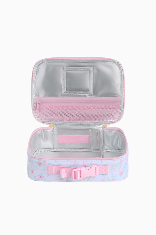 Pink and gray toiletry bag with a bow on a white background