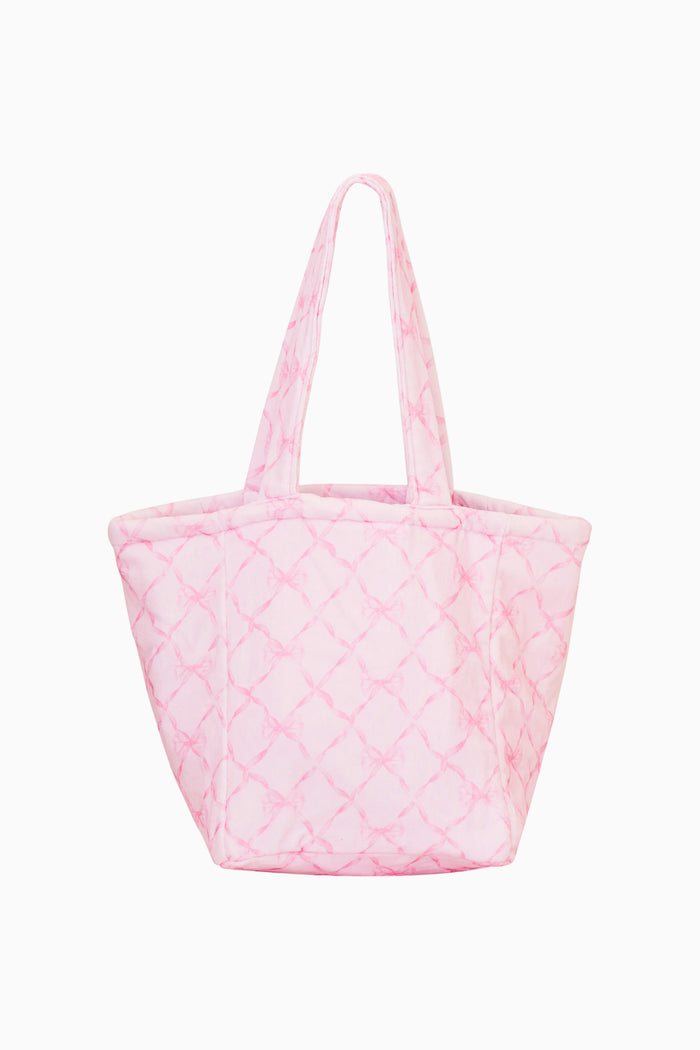 Pink bow print large tote bag against a white background