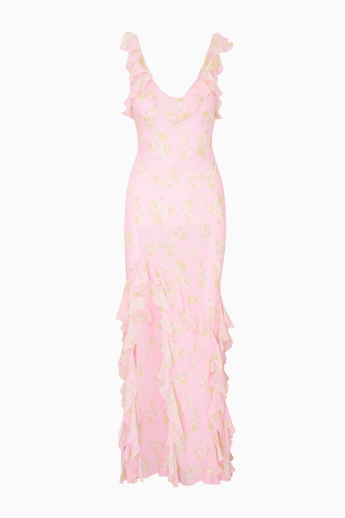 Pink ruffled maxi dress on a white background