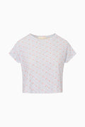 Light blue t-shirt with small pattern on a white background