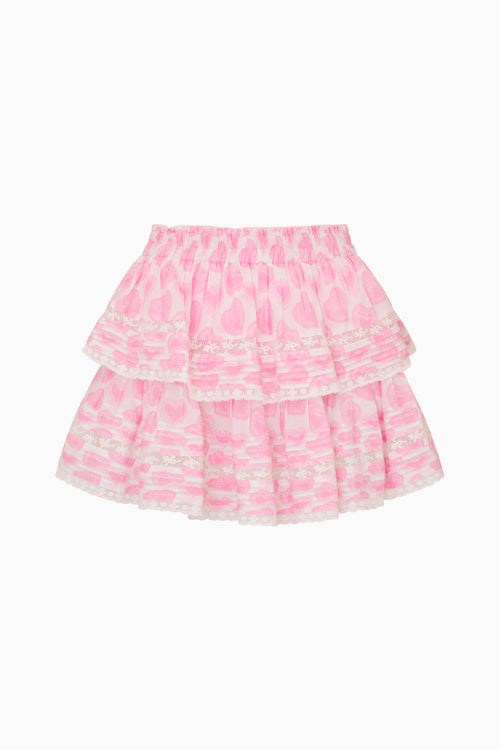Pink tiered skirt with white pattern on a white background