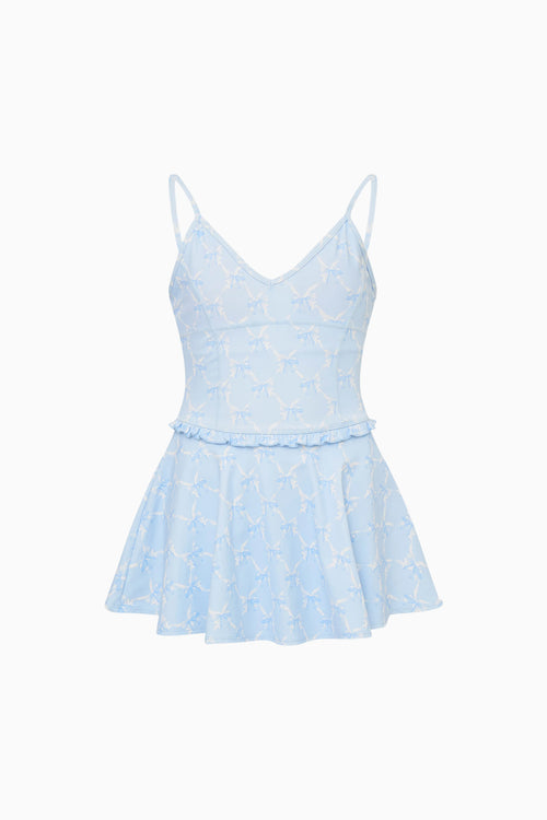Light blue dress with thin straps on a white background