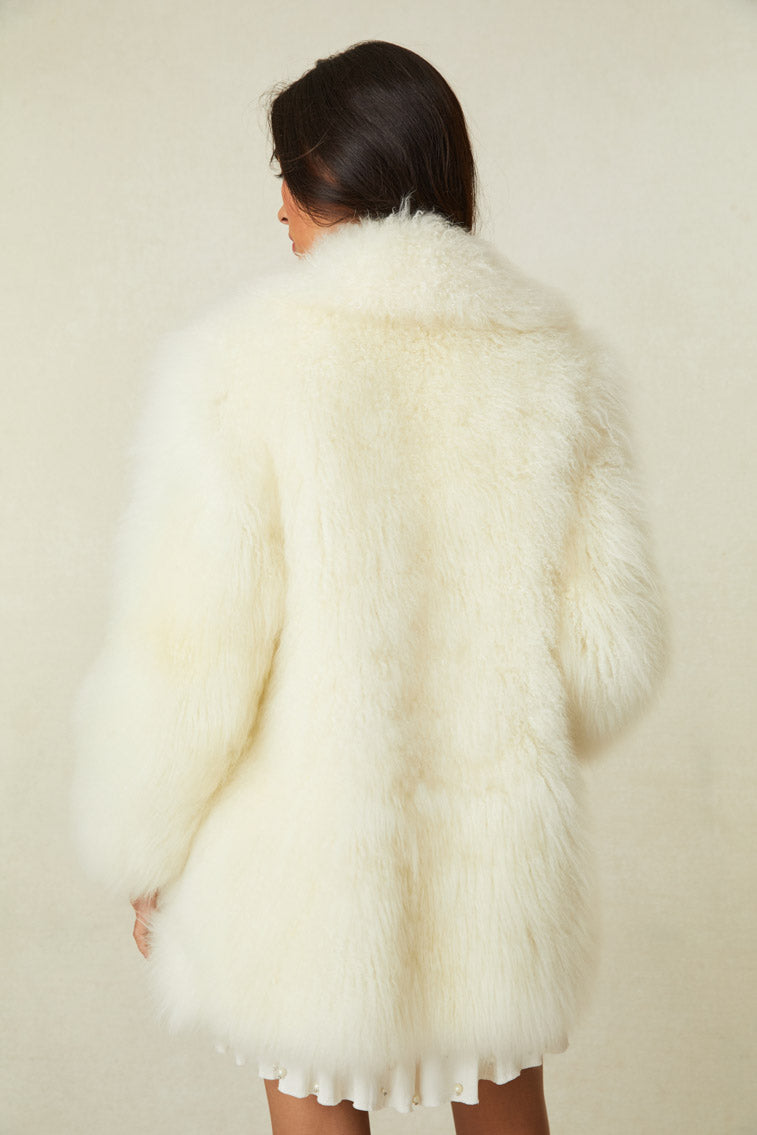 White fur shearling jacket.