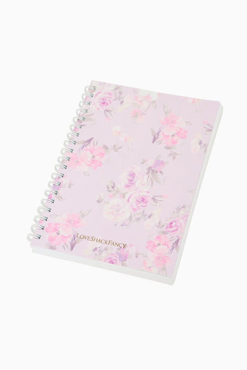 Floral notebook with pink and purple flowers on a white background