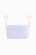 Light blue top with pink floral pattern and thin straps on a white background