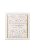 Blush scented candle with LoveShackFancy Secret Crush label on square lid