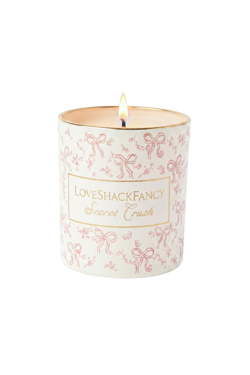 Blush scented candle with lit wick and LoveShackFancy Secret Crush printed wrap