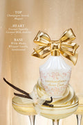 White LoveShackFancy perfume bottle with large gold bow, heart design and ribbon accents.