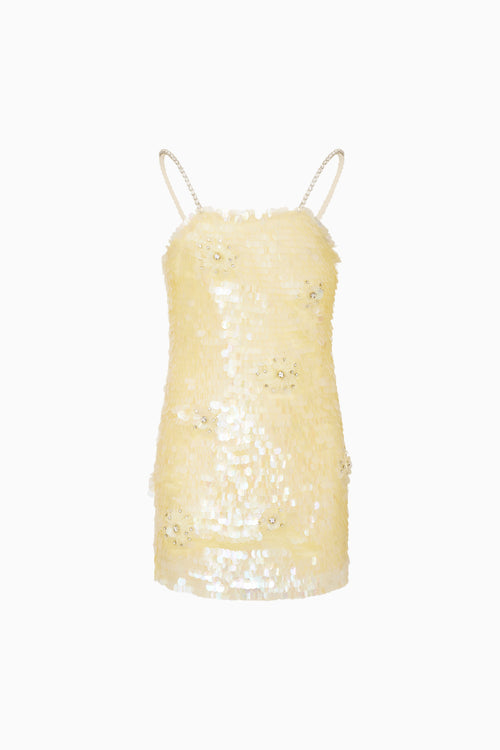 Yellow sequin dress on a white background