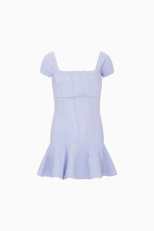 Light blue knitted dress on a white background