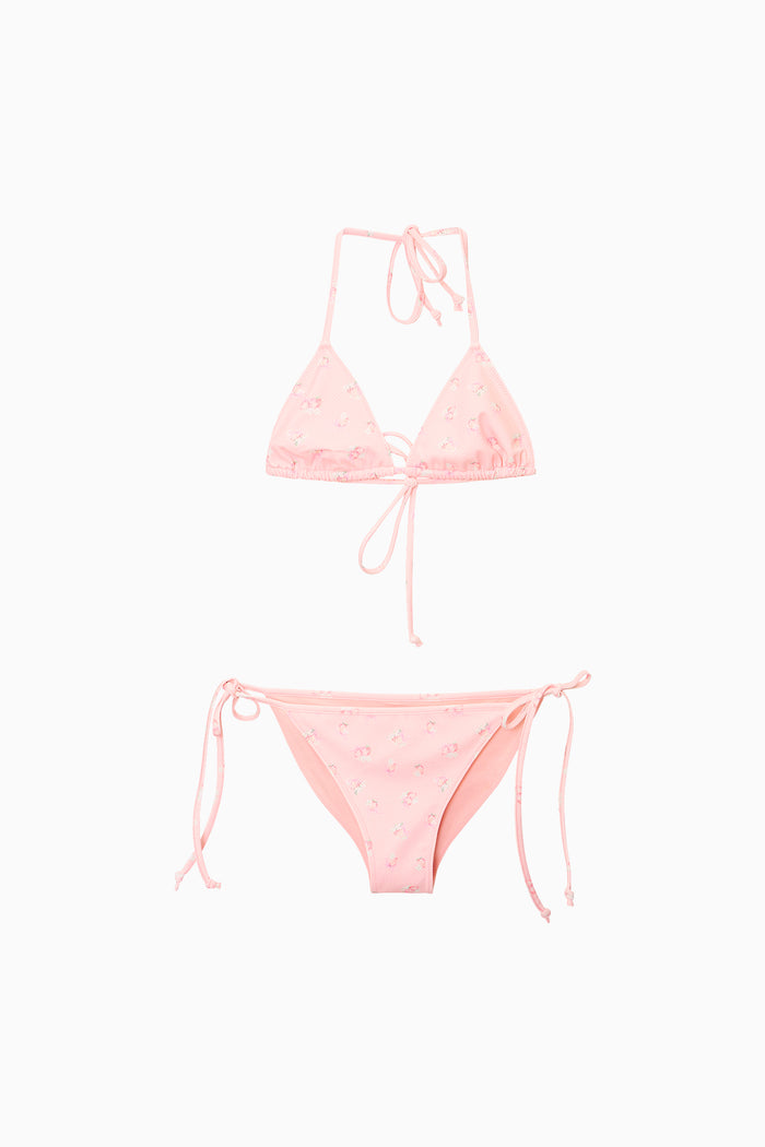 Pink bikini set on a white background