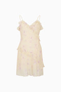 Light yellow dress with floral patterns on a white background
