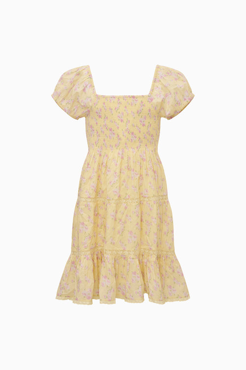 Yellow floral dress with puff sleeves on a white background